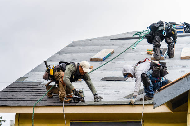 Professional Gutter Installation technician working in Garnett, KS